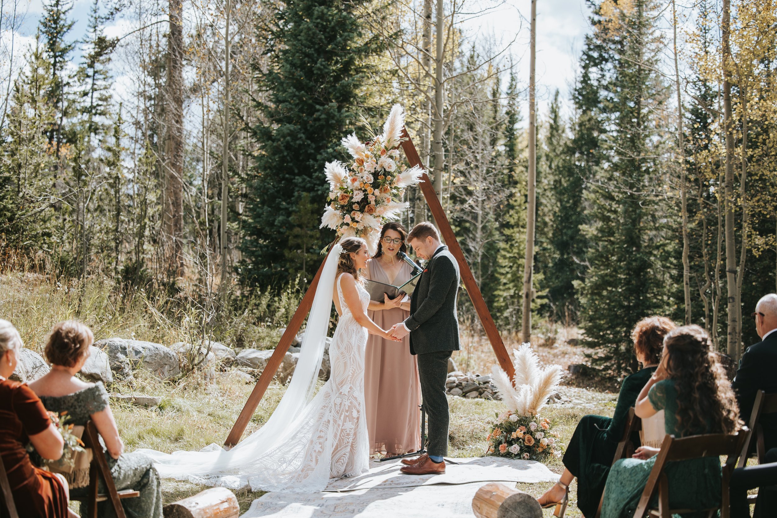 A small backyard ceremony for a micro wedding in the mountains