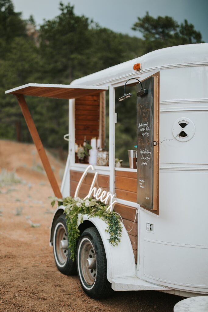 A pretty drink cart at a couple's micro wedding.
