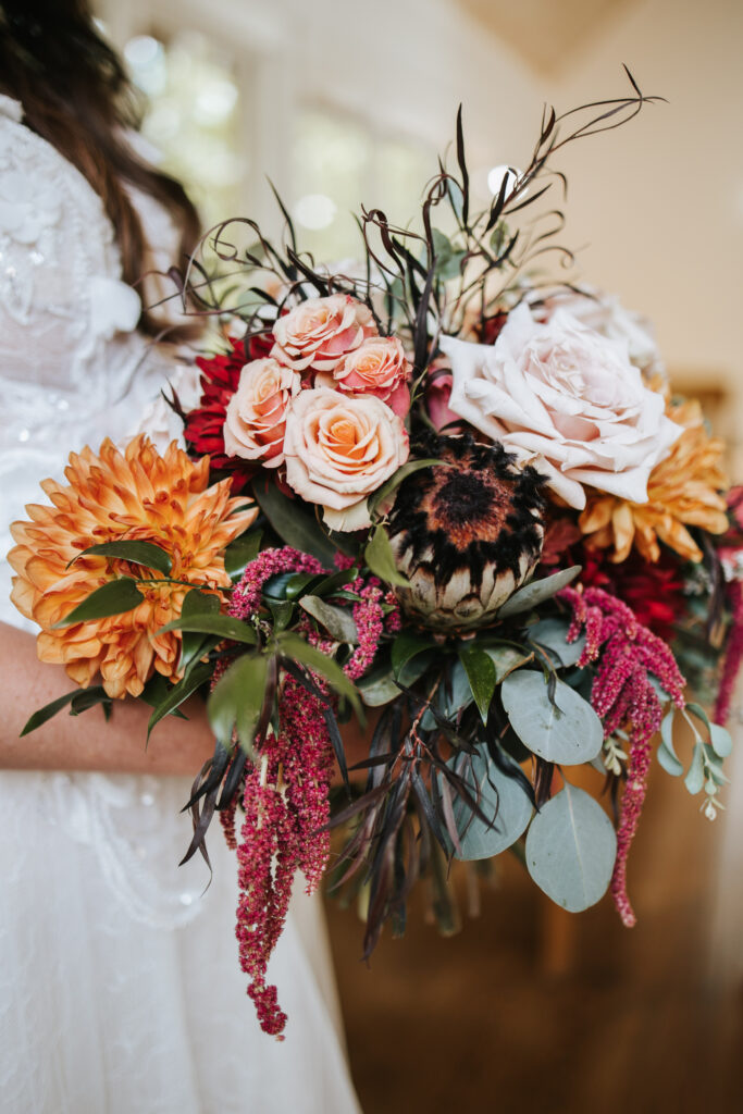 Beautiful wildflower bouquet from a bride on her intimate wedding day.