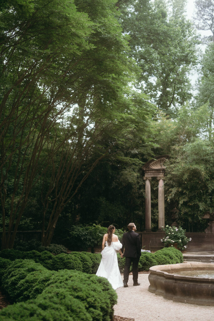 Outdoor wedding ceremony in a lush garden at an Atlanta venue.