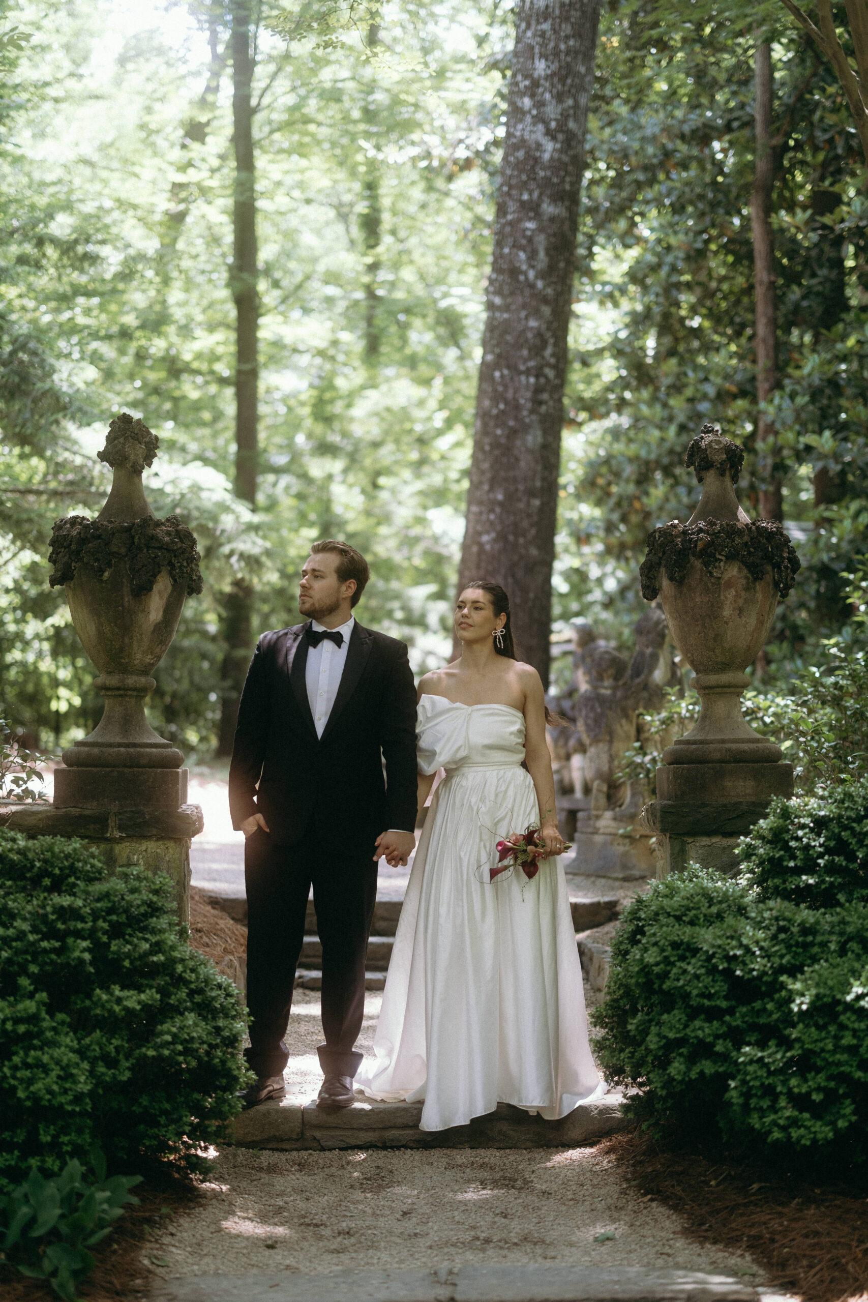 Bride and groom share a moment in a gorgeous Atlanta venue garden.